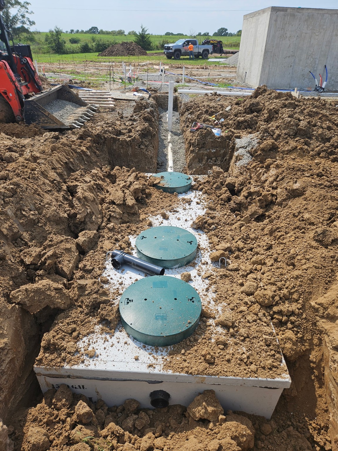 A new concrete septic tank installed by Curfman Plumbing and Septic