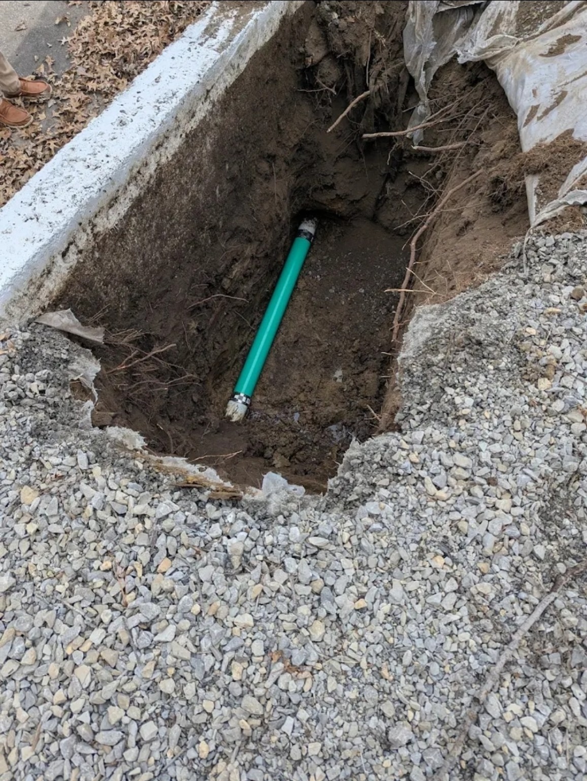 A repaired sewer line with new piping